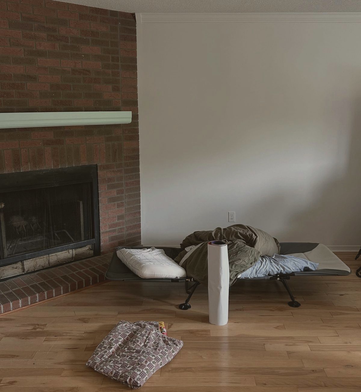 Fireplace wall before staging